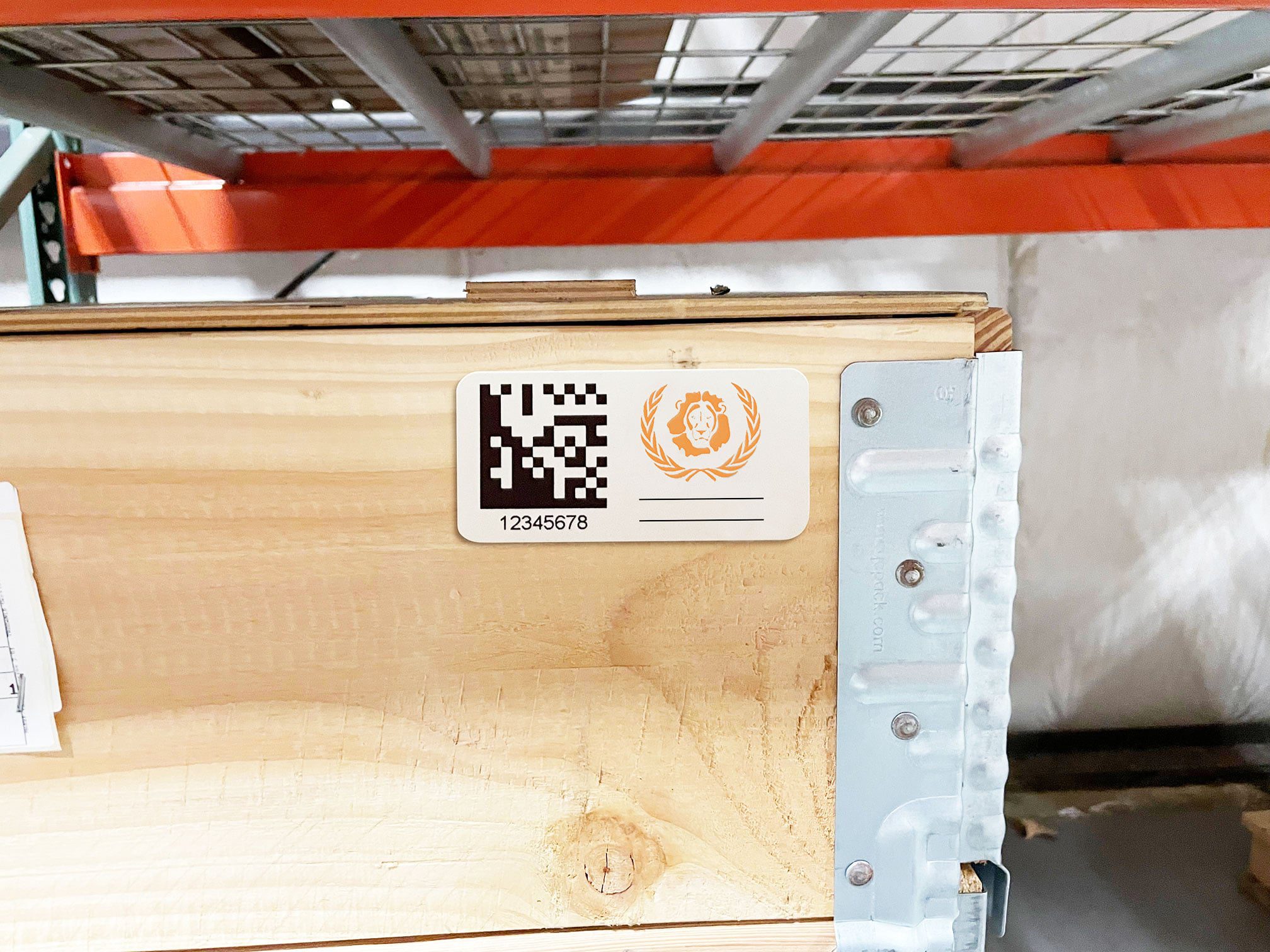 long-term asset label on wood storage crate in warehouse racking