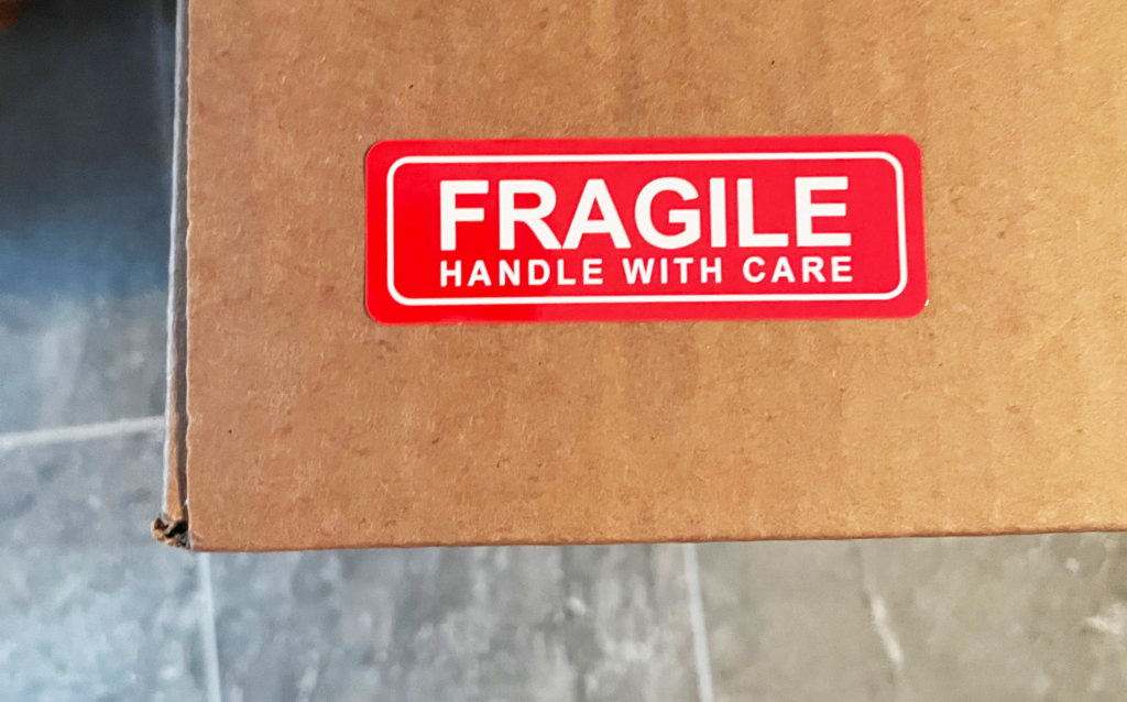 Fragile sticker on a shipping box