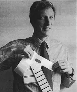 Paul Henkel holding blank labels 