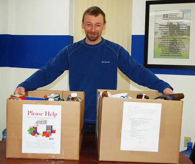 Label Expert Jason Wilder with donation boxes