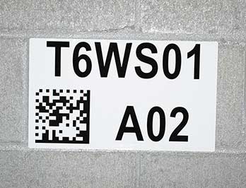 2D barcode label on a warehouse wall
