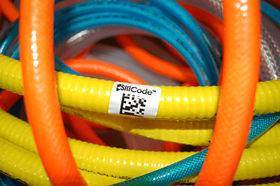 Pile of various colored silicone hoses labeled with a SiliCode label