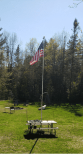 united states flag outside in a backyard