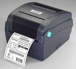 Black TSC printer printing labels 