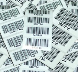 Assortment of white barcoded labels 