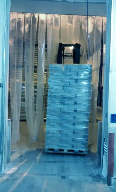 Entrance to a cold storage warehouse with labels for cold chain logistics