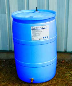 Blue drum for liquids outdoors