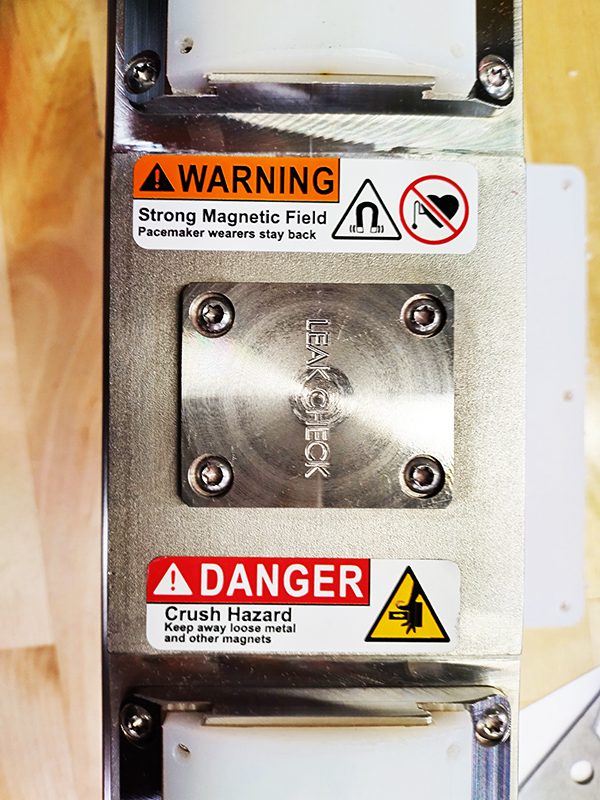 Warning labels on manufacturing components