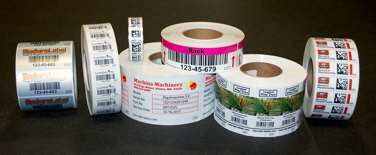 Multiple rolls of printed labels and tags