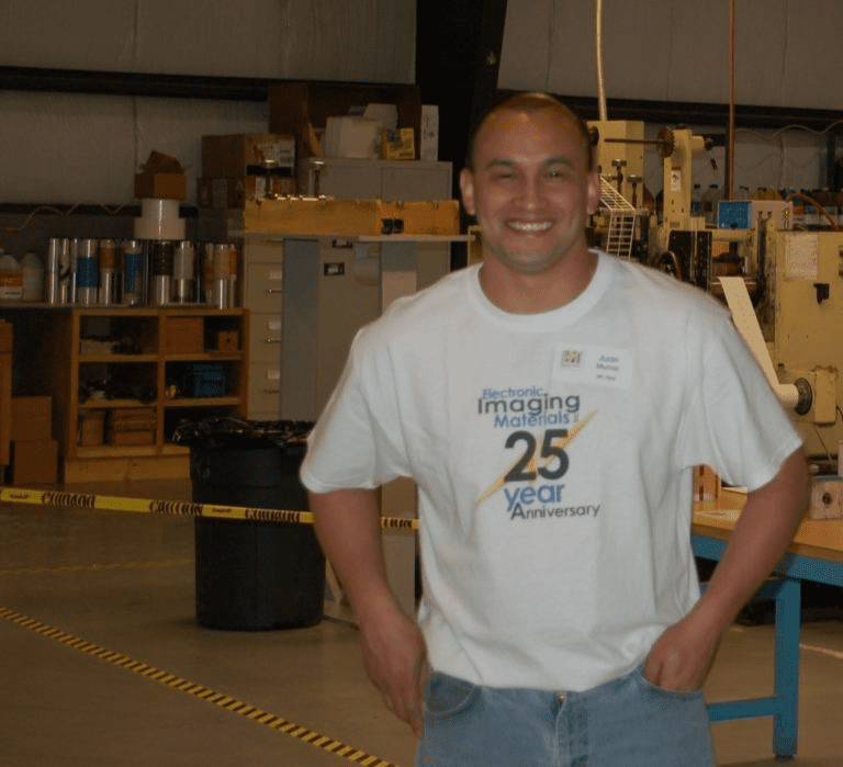 Label Expert wearing 25 year anniversary shirt