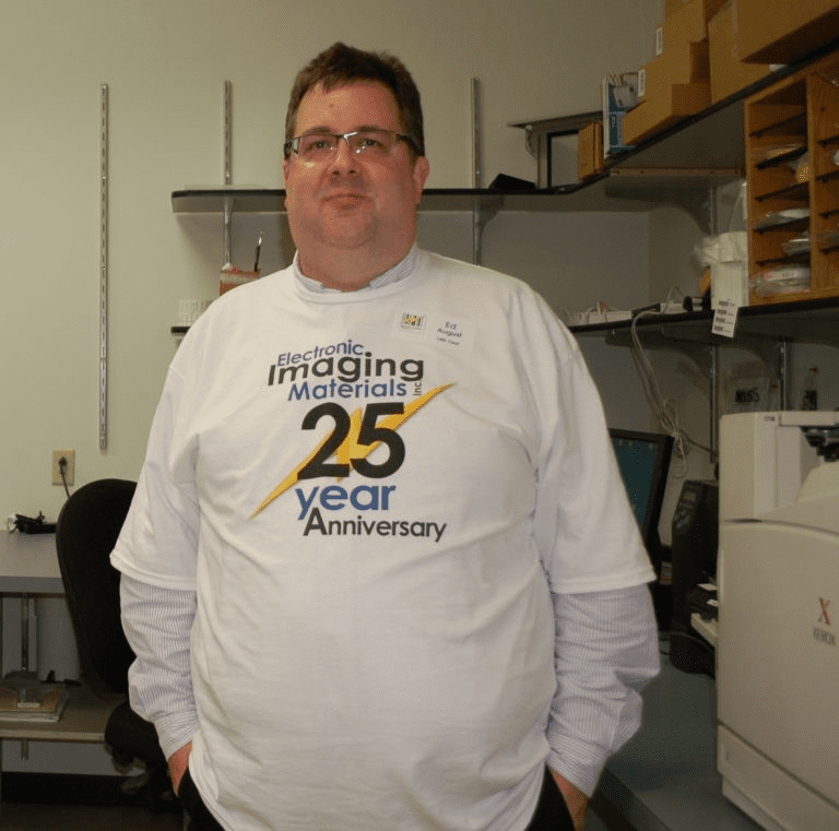 Label Expert wearing 25 year anniversary shirt