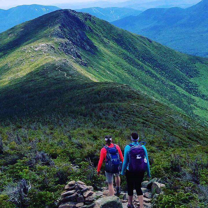 Label Expert Erin Temmen hiking mountain with friend