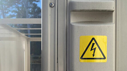 Electrical warning label on machinery