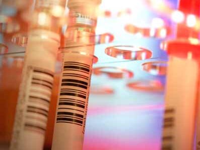 Barcode labeled sample test tubes close up shot