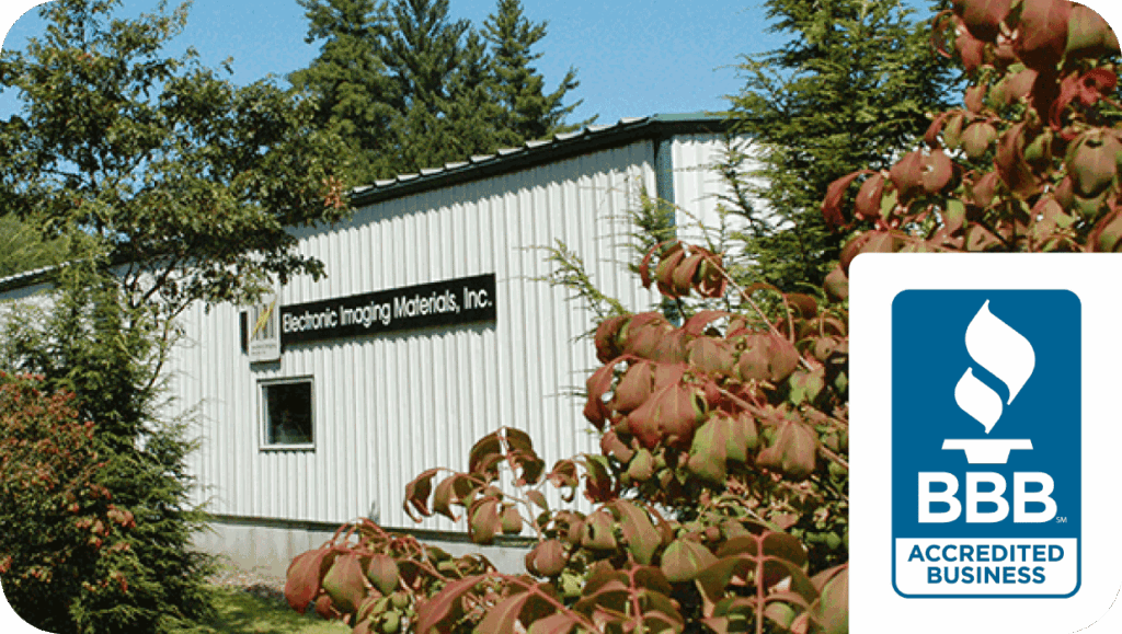 Round corner image of outside the Electronic Imaging Materials building with a 'BBB: Accredited Business' emblem in the bottom right corner.